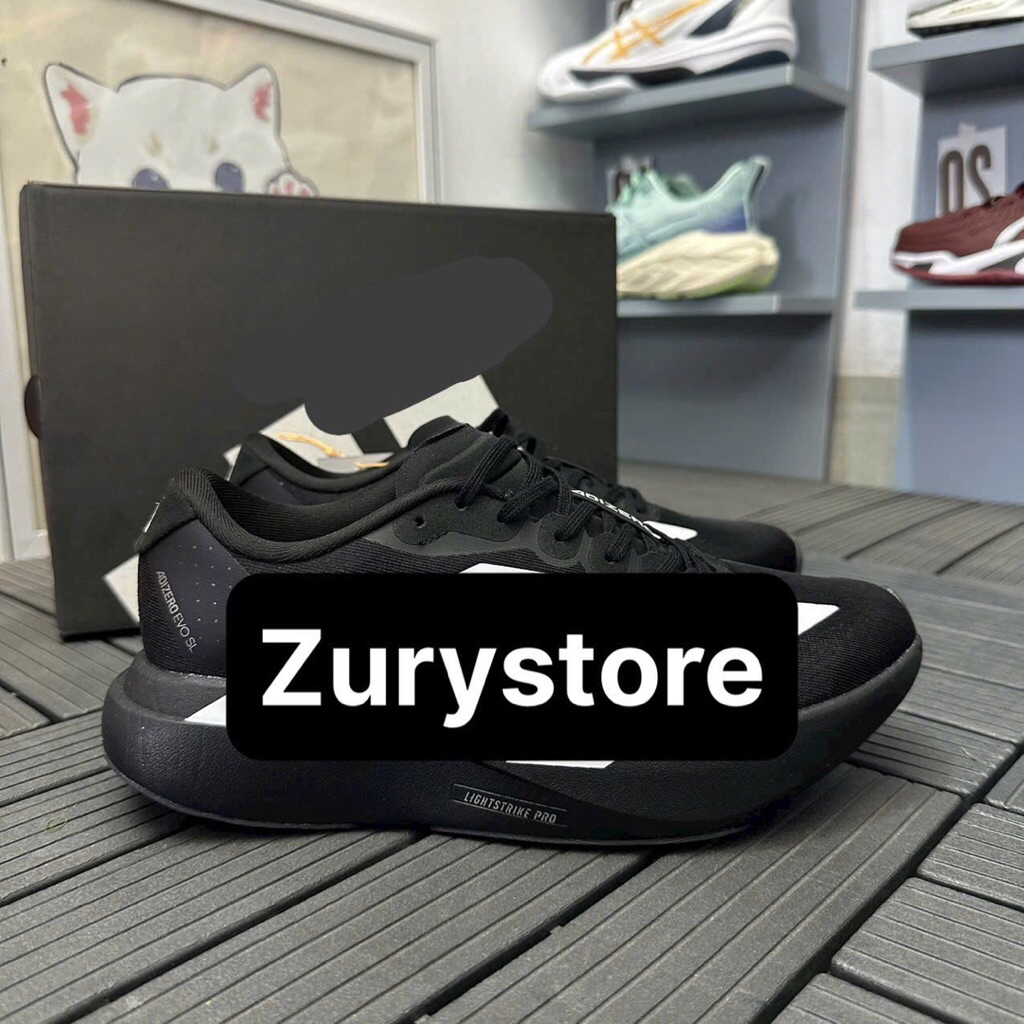 รองเท้าผ้าใบ Adizero Evo Evo สีดําและสีขาว