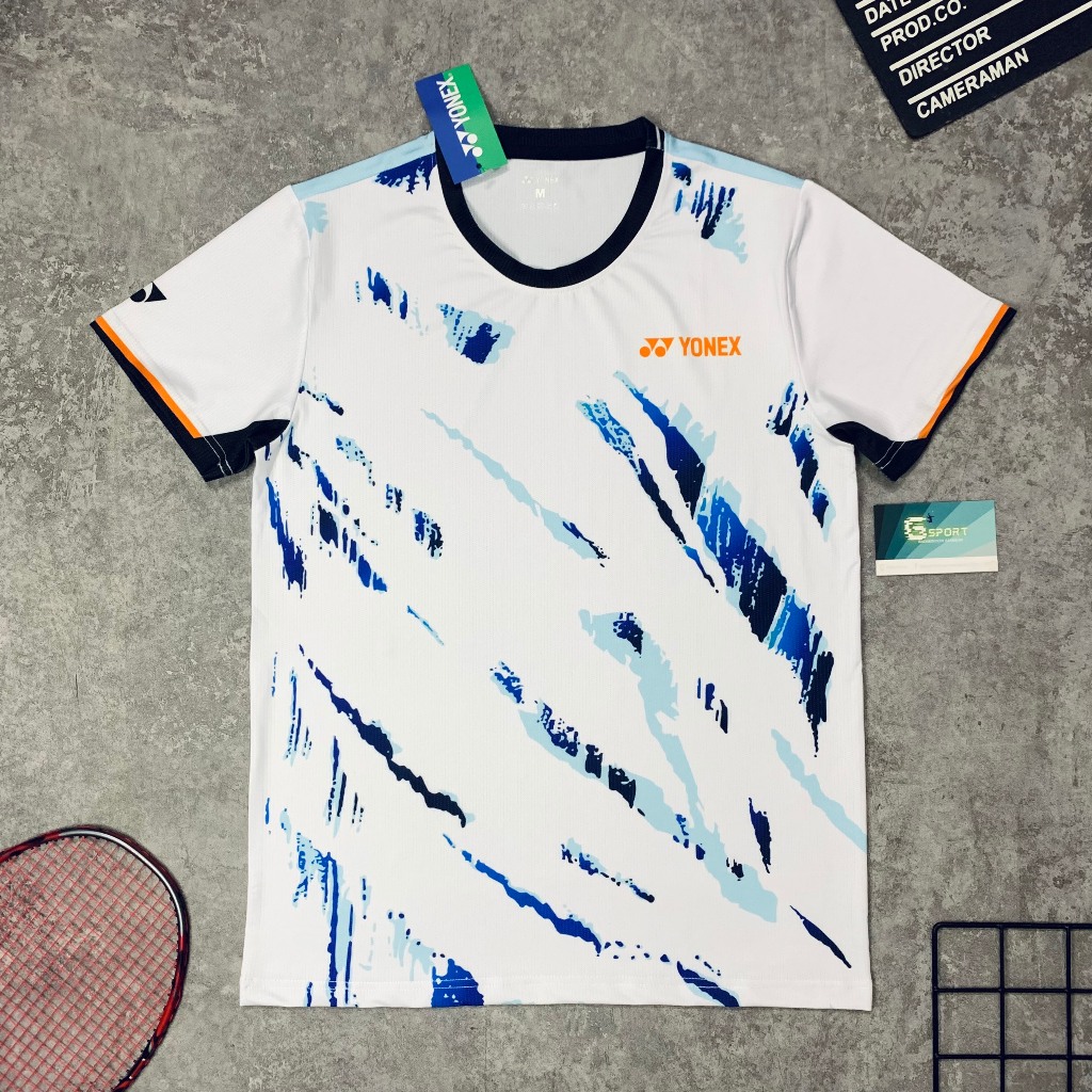 เสื้อแบดมินตันสีขาวและสีน้ําเงิน ประทับใจ โยเน็กซ์ เสื้อกีฬาใหม่ผ้ายืดระบายอากาศ