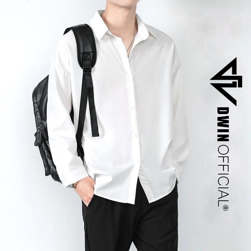 DWIN เสื้อเชิ้ตแขนยาวธรรมดาพื้นฐานสําหรับผู้ชายและผู้หญิงทําจากกํามะหยี่ทอลายทแยงเกาหลีต่อต้านริ้วรอ