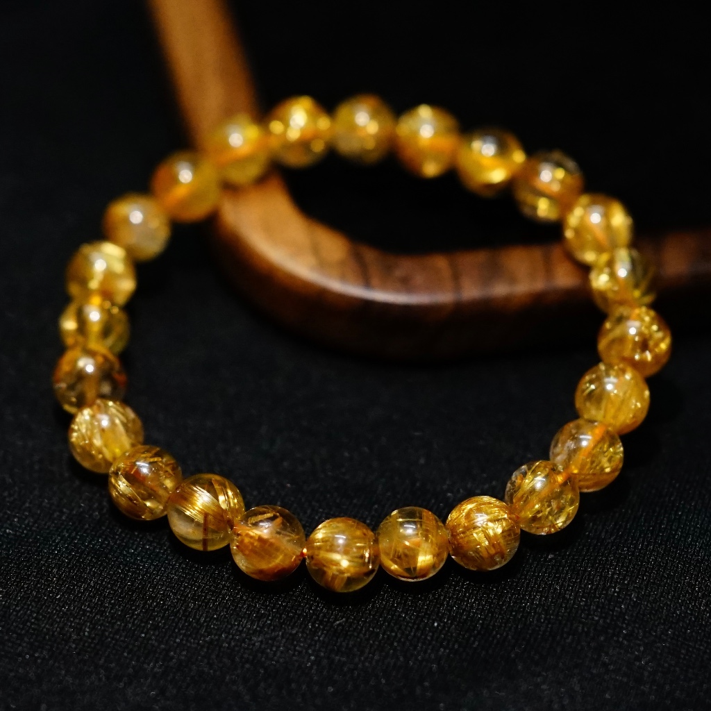 (ธรรมชาติ 100%) เมล็ดหิน ODDS Golden Rutilated Quartz ขนาด 7mm (Golden Rutilated Quartz) - NHA PHAN