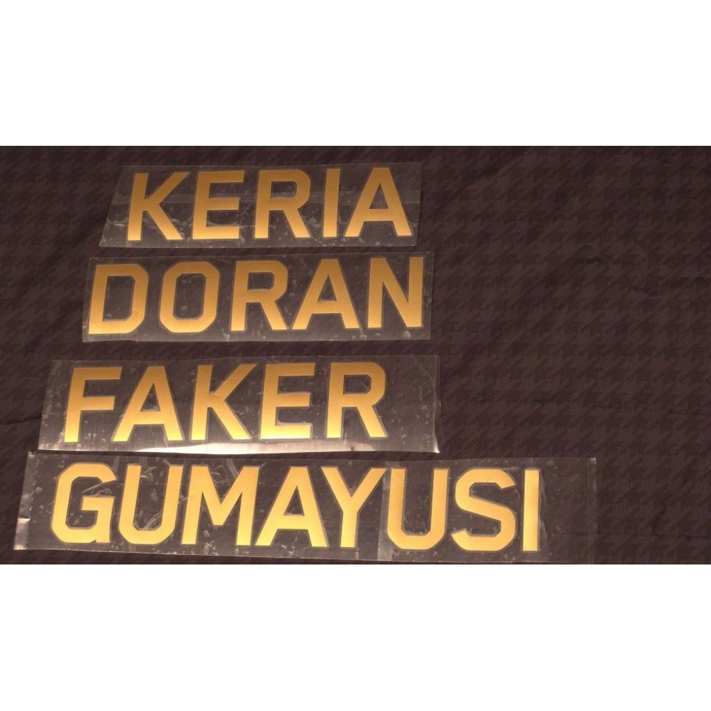 เครื่องหมายพิมพ์ด้วย NAME T1 CKTG 2025 (JACKET)