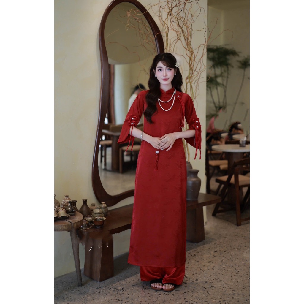 Mong Giao ผ้าโมเดิร์น ao dai พร้อมคอเต่า แขนผ่า และโบว์เลื่อน ao dai พร้อมกางเกงผ้าไหม TAM AD 25