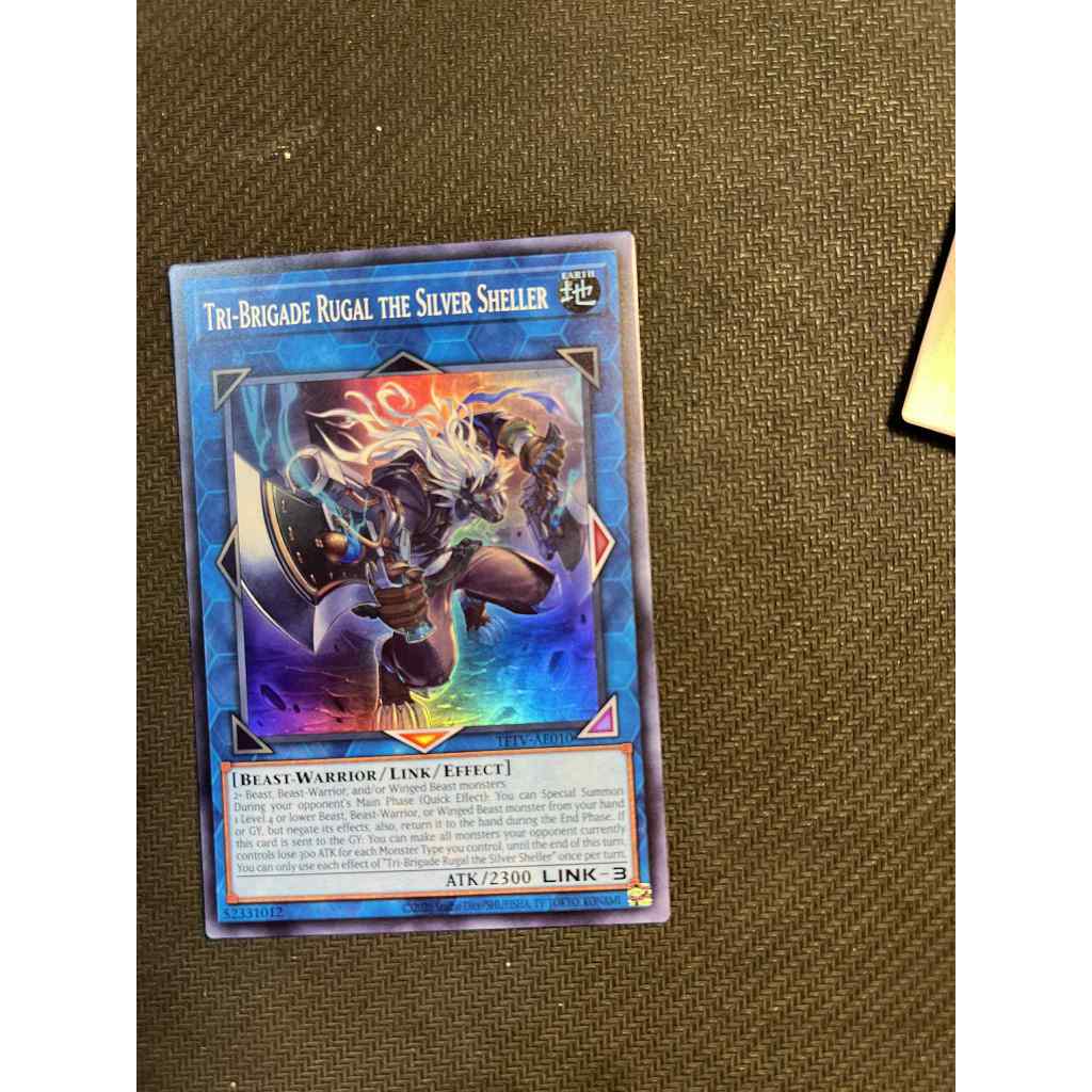การ์ด Yugioh ของแท้ Tri-Brigade Rugal the Silver Sheller TFTV-AE010