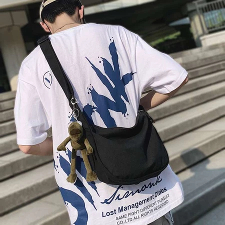 Street Style Hip-Hop กระเป๋าผ้าใบความจุขนาดใหญ่สําหรับทั้งชายและหญิงผ้าใบธรรมดากระเป๋าสะพายข้าง