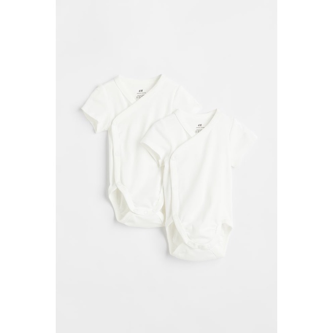 [แยกชุด] ชุดบอดี้สูทสีขาวแขนสั้นพร้อมพนังแนวทแยง baby HM H&M_สินค้าแท้แท้